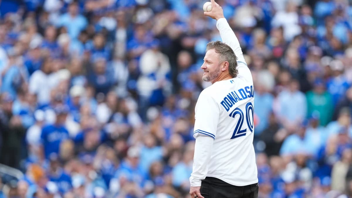 Former Toronto Blue Jays Josh Donaldson throws the first pitch before the game between the Toronto Blue Jays and Seattle Mariners during game two of the ALCS round for the 2025 MLB playoffs at Rogers Centre.