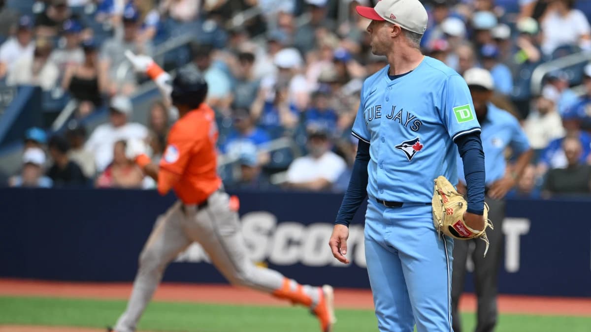Toronto Blue Jays relief pitcher Trevor Richards looks on as Houston Astros shortstop Jeremy Pena (3) rounds the bases after hitting a solo home run in the seventh inning at Rogers Centre.