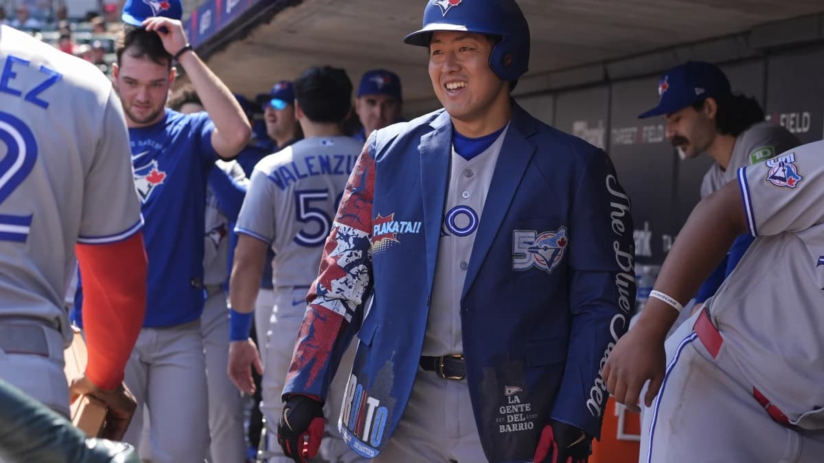 Toronto Blue Jays third baseman Kazuma Okamoto (7) celebrates his solo home run against the Minnesota Twins in the sixth inning at Target Field.