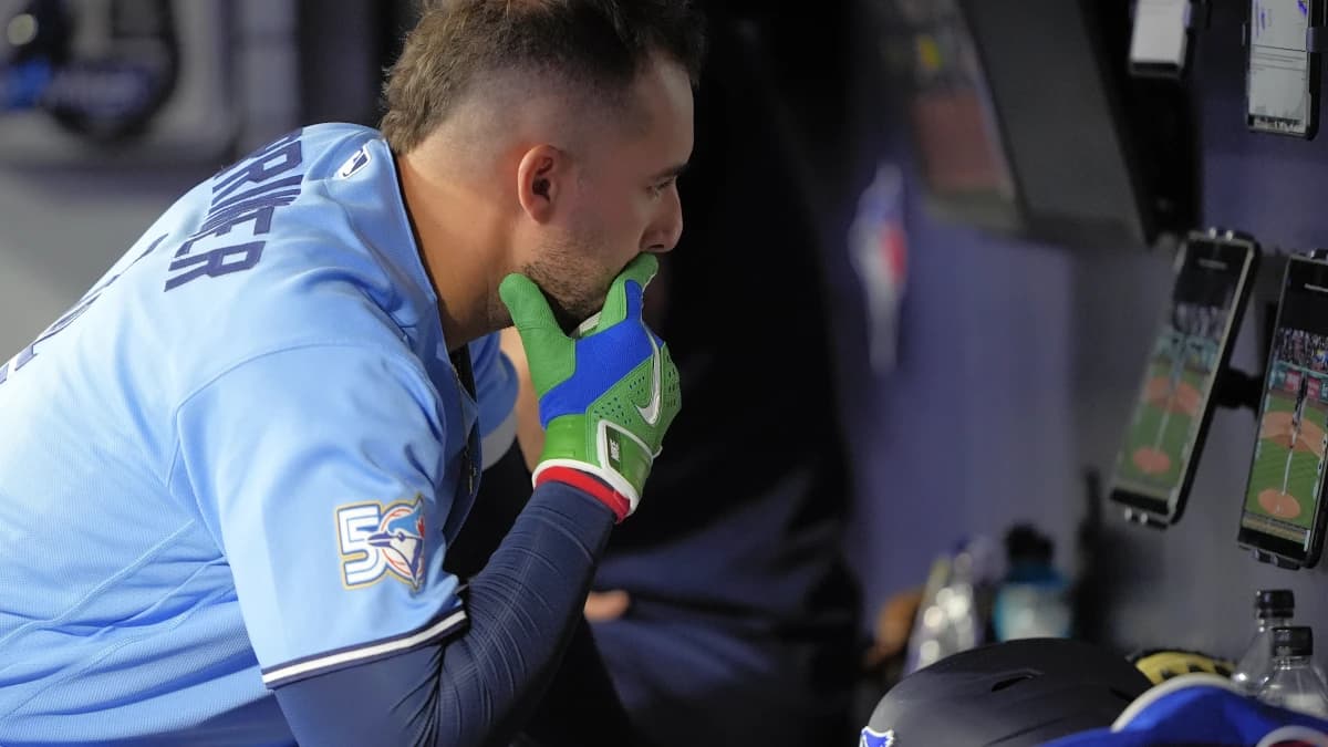 Toronto Blue Jays designated hitter George Springer (4) reviews video during the seventh inning against the Boston Red Sox at Rogers Centre.