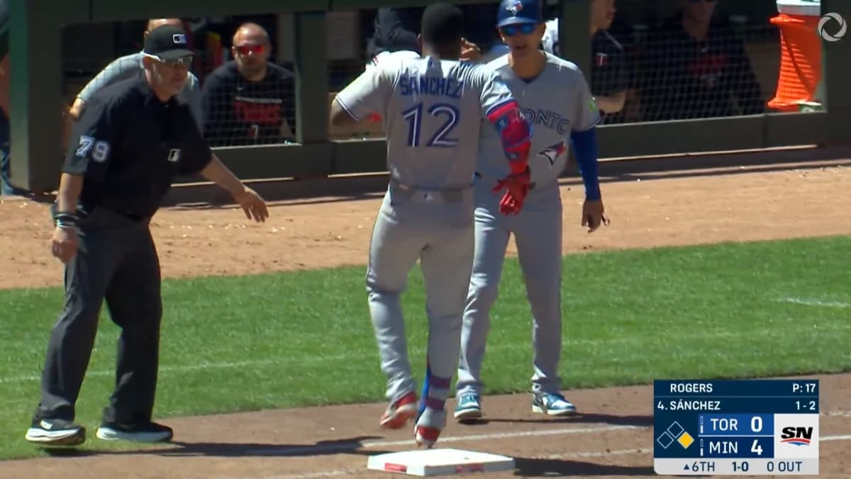 Jesus Sanchez injures himself rounding first base against the Twins
