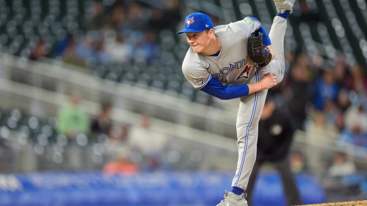 Toronto Blue Jays pitcher Louis Varland (77) throws to Minnesota Twins center fielder James Outman (30) in the ninth inning at Target Field.