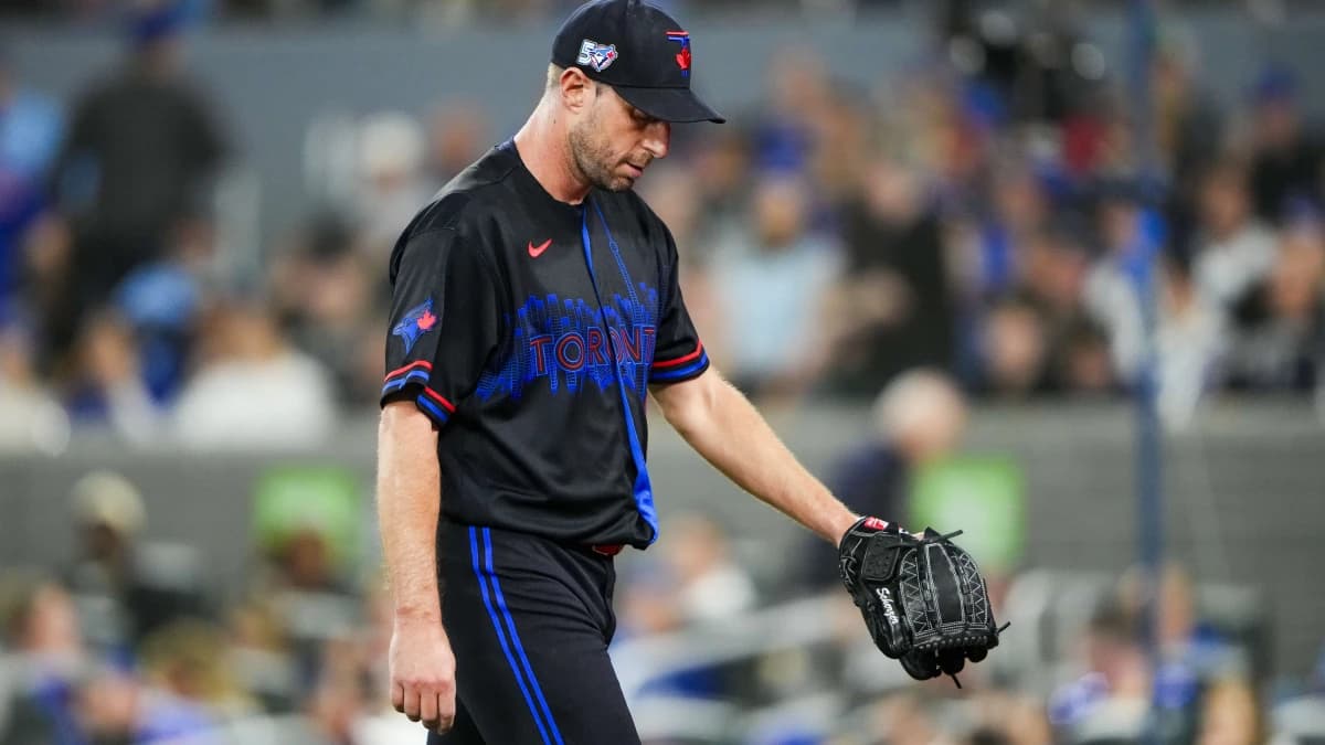 Toronto Blue Jays pitcher Max Scherzer (31) walks to the dugout during the third inning after being relieved at a MLB game against the Cleveland Guardians at Rogers Centre.
