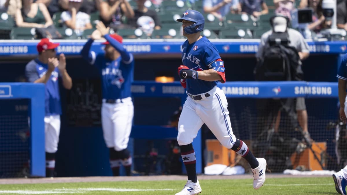 Toronto Blue Jays center Randal Grichuk (15) rounds the bases after hitting a home run during the second inning against the Tampa Bay Rays at Sahlen Field.