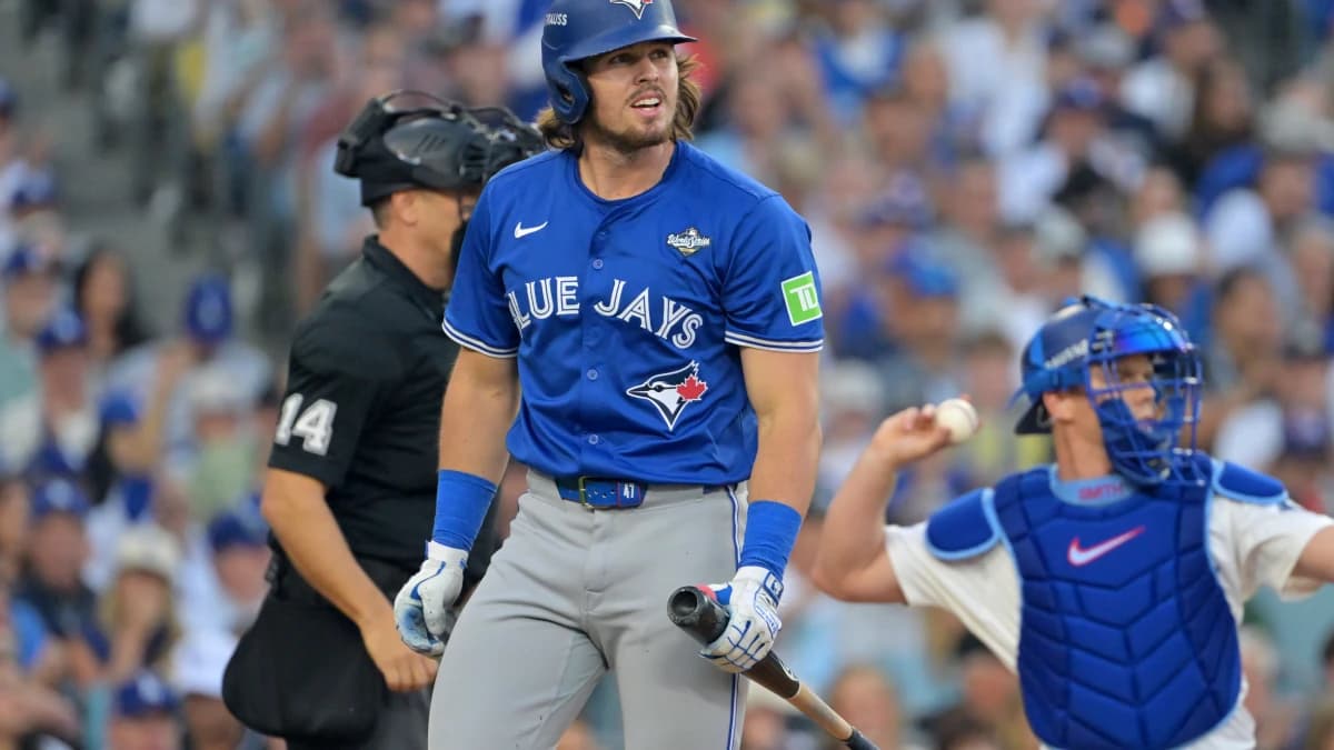 Toronto Blue Jays third baseman Addison Barger (47) reacts after striking out in the second inning against the Los Angeles Dodgers during game three of the 2025 MLB World Series at Dodger Stadium.