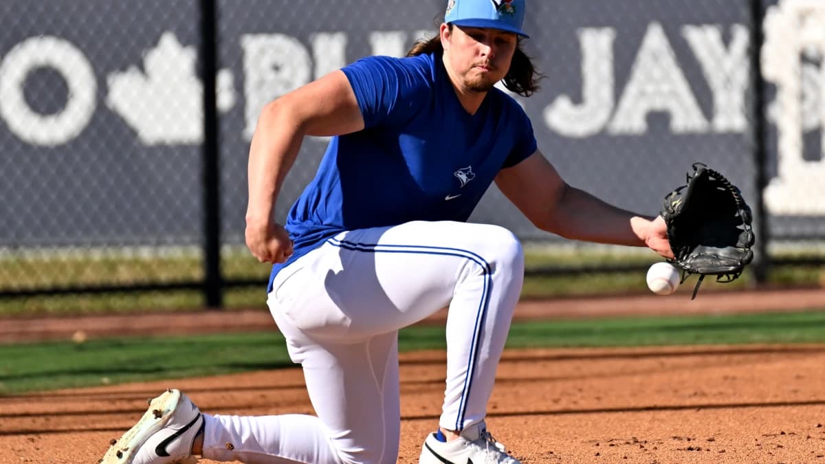 Toronto Blue Jays outfielder Addison Barger (47) fields a ground ball during spring training at Bobby Mattick Training Center at Englebert Complex.
