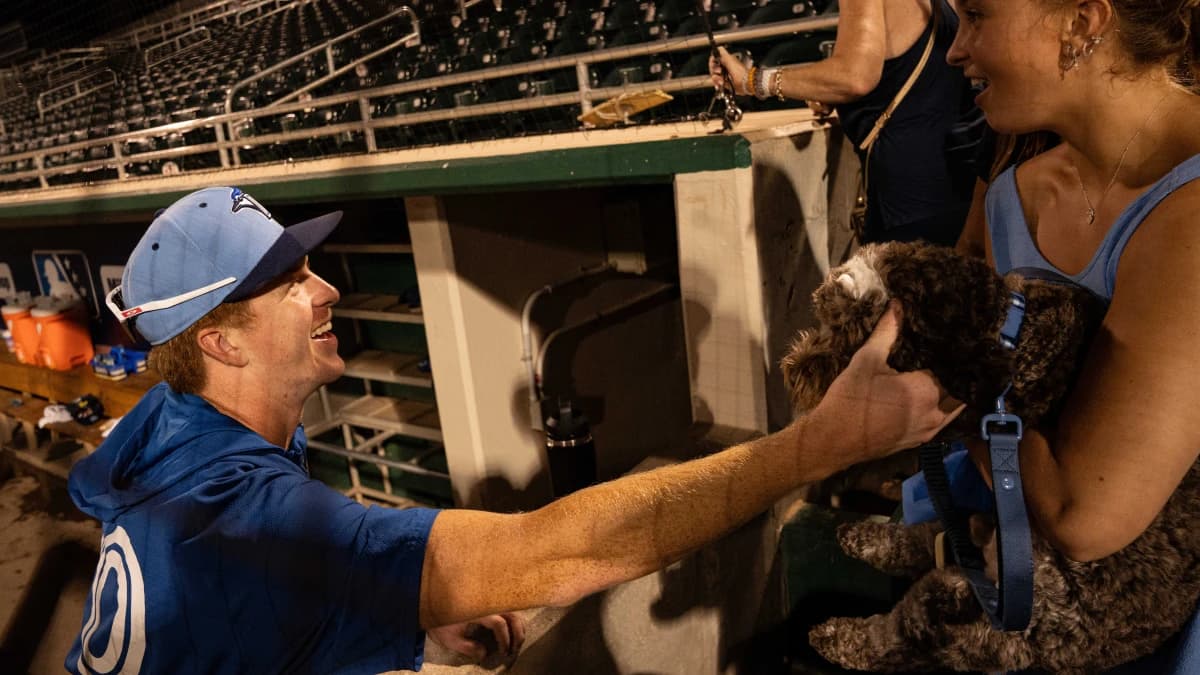Johnny King, a pitcher for the Dunedin Blue Jays greets family and friends after a game against the Fort Myers Mighty Mussels at Hammond Stadium on Saturday, Aug. 2, 2025. King is a Naples High School alum and two time baseball player of the year.