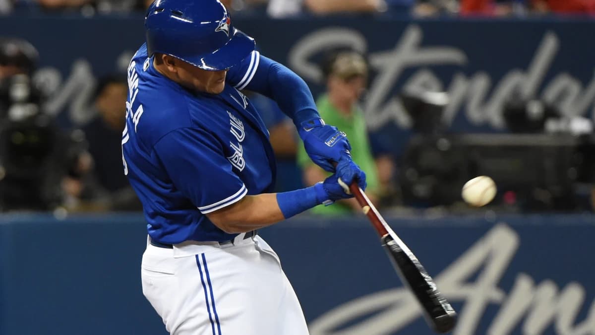 Toronto Blue Jays shortstop Gio Urshela (3) hits a run scoring single against Oakland Athletics in the fifth inning at Rogers Centre.