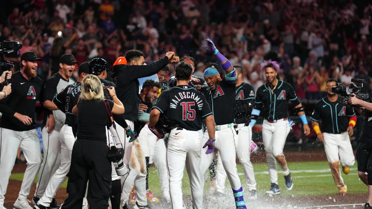 Arizona Diamondbacks second baseman Ketel Marte (4) is doused with water by teammates after hitting a three run walk off home run against the San Francisco Giants during the ninth inning at Chase