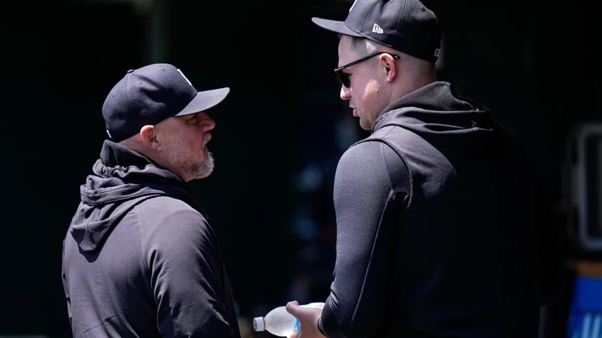 Detroit Tigers pitcher Tarik Skubal (29), right, talk to assistant pitching coach Robin Lund (63) in the dugout during the fourth inning between Detroit Tigers and Cleveland Guardians at Comerica Park in Detroit on Thursday, May 21, 2026.