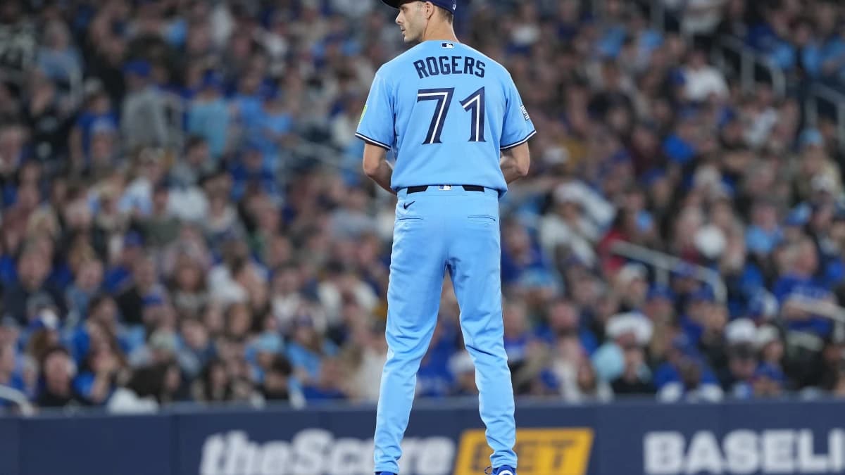 Toronto Blue Jays relief pitcher Tyler Rogers (71) gets ready to throw a pitch against the Boston Red Sox during the eighth inning at Rogers Centre.