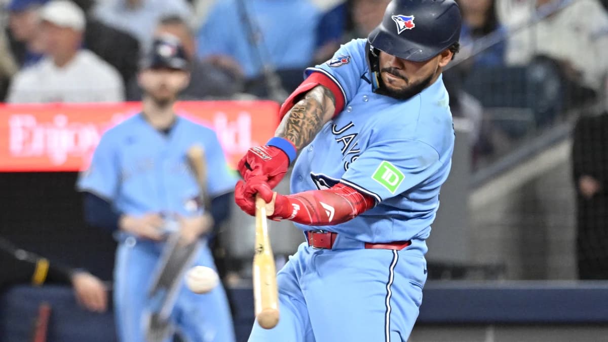 Toronto Blue Jays left fielder Yohendrick Pinango (24) hits a single against the Pittsburgh Pirates in the sixth inning at Rogers Centre.