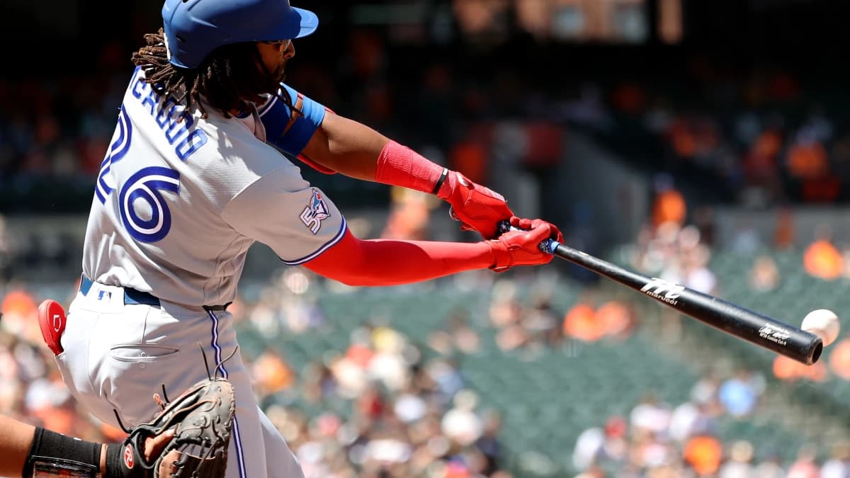 Toronto Blue Jays first baseman Charles McAdoo (26) hits a single during the eighth inning against the Baltimore Orioles at Oriole Park at Camden Yards.