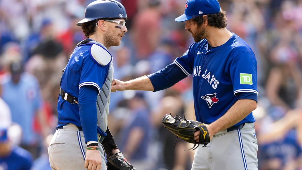 Toronto Blue Jays pitcher Jordan Romano (68) and catcher Danny Jansen (9) react to a victory against the Philadelphia Phillies at Citizens Bank Park