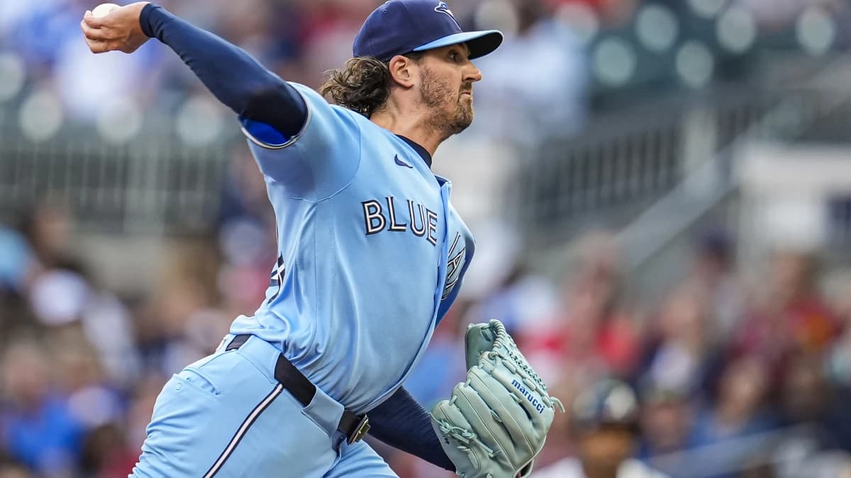 Toronto Blue Jays pitcher Kevin Gausman (34) pitches against the Atlanta Braves during the first inning at Truist Park.