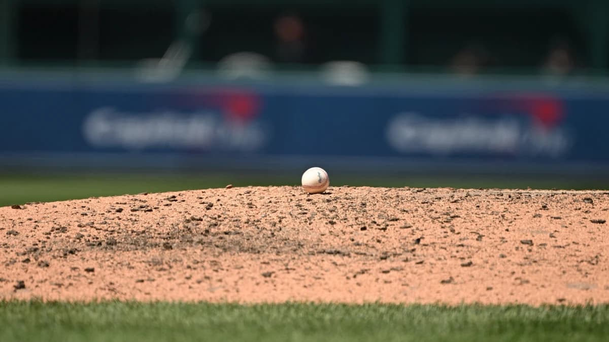 A baseball rests on the pitchers mound during the sixth inning of a game between the Washington Nationals and the Miami Marlins at Nationals Park.