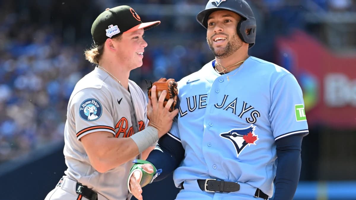 Toronto Blue Jays designated hitter George Springer (4) is tagges out at first base by Baltimore Orioles second baseman Jackson Holliday (7) after being caught in a baseline rundown in the fourth inning at Rogers Centre.