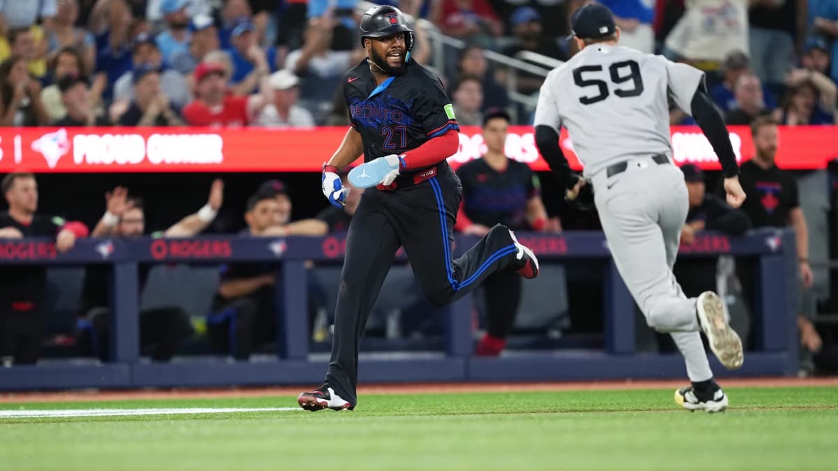 Toronto Blue Jays first baseman Vladimir Guerrero Jr. (27) runs to home plate scoring a run on a catcher Alejandro Kirk (30) (not pictured) an RBI single against the New York Yankees during the fifth inning at Rogers Centre.