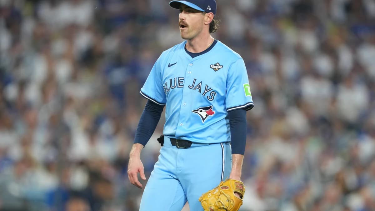 Toronto Blue Jays pitcher Shane Bieber (57) reacts in the third inning against the Los Angeles Dodgers during game four of the 2025 MLB World Series at Dodger Stadium. M