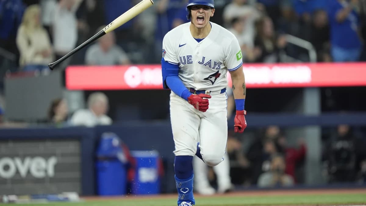 Toronto Blue Jays catcher Brandon Valenzuela (59) tosses his bat and reacts after hitting a walk off RBI single to win the game against the Philadelphia Phillies during the ninth inning at Rogers Centre.