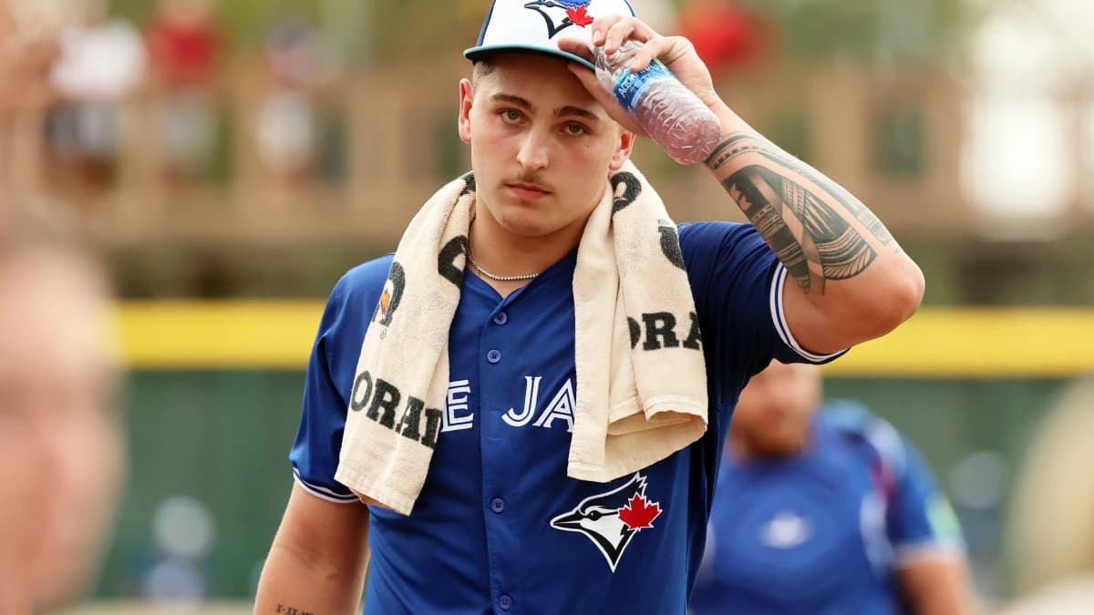 Toronto Blue Jays pitcher Ricky Tiedemann (70) walks to the dugout before the game against the Pittsburgh Pirates at LECOM Park.