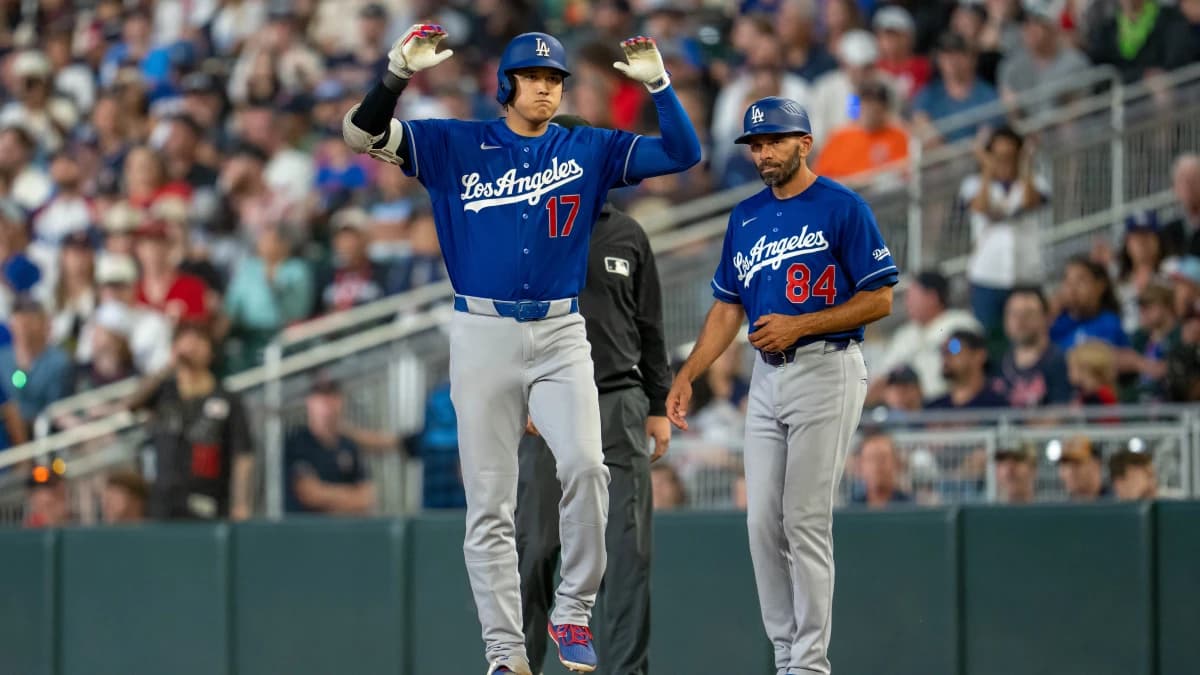 Los Angeles Dodgers starting pitcher Shohei Ohtani (17) celebrates hitting a single against the Minnesota Twins in the ninth inning at Target Field.