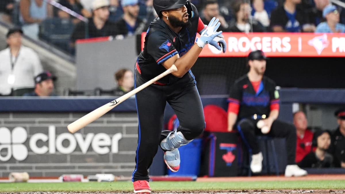 Toronto Blue Jays first baseman Vladimir Guerrero Jr. (27) hits a two RBI single against the Texas Rangers in the eighth inning at Rogers Centre.
