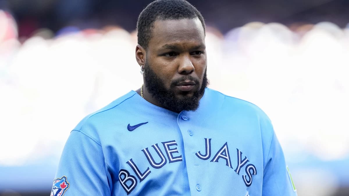 Toronto Blue Jays first baseman Vladimir Guerrero Jr. (27) returns to the dugout during the sixth inning against the Texas Rangers at Rogers Centre.