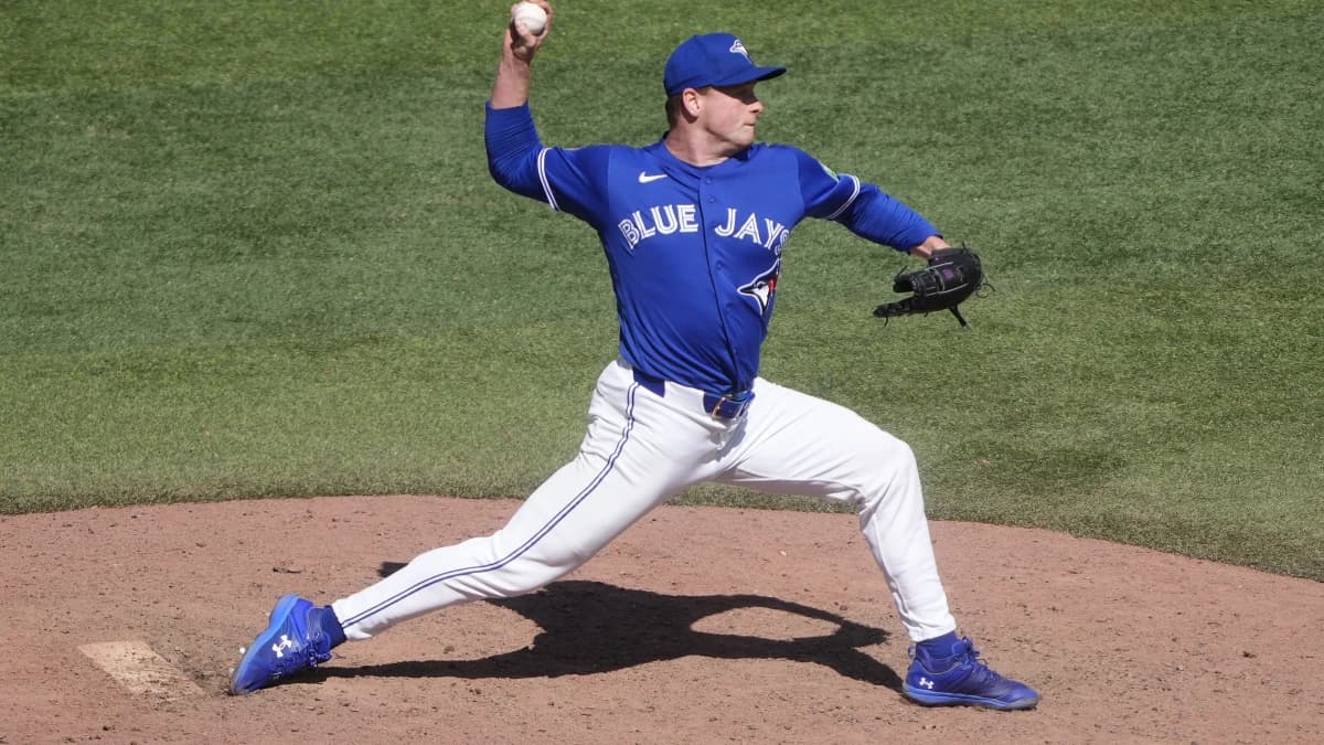 Toronto Blue Jays starting pitcher Louie Varland (77) pitches to the Texas Rangers during the ninth inning at Rogers Centre.