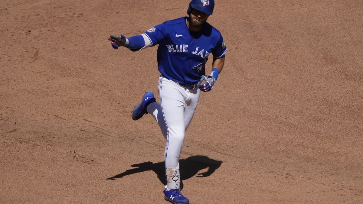 Toronto Blue Jays right fielder Nathan Lukes (38) waves to the fans as he rounds the bases on his two run home run against the Texas Rangers during the eighth inning at Rogers Centre.