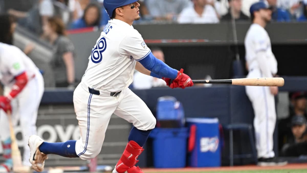 Toronto Blue Jays second baseman Luis Urias (48) hits a double against the New York Mets in the fifth inning at Rogers Centre.