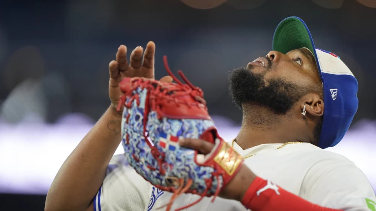 Toronto Blue Jays first baseman Vladimir Guerrero Jr. (27) sets up to catch a fly ball hit by Texas Rangers center fielder Wyatt Langford (not pictured) during the seventh inning at Rogers Centre.