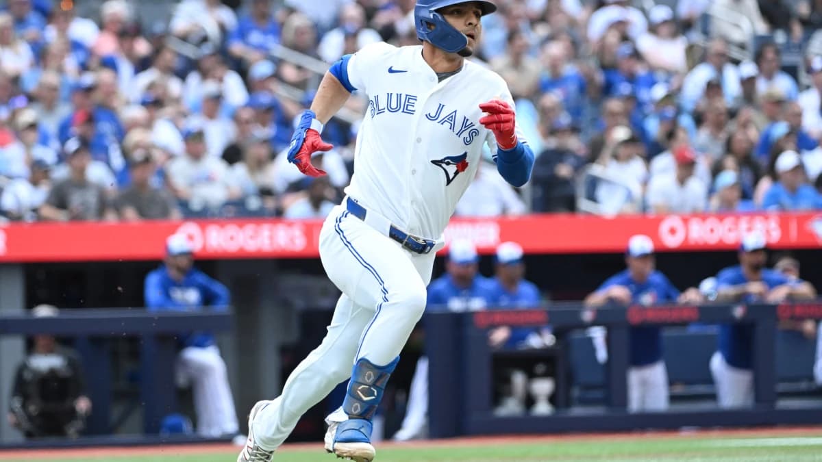 Toronto Blue Jays shortstop Andres Gimenez (0) runs the bases after hitting a double against the Houston Astros in the second inning at Rogers Centre.