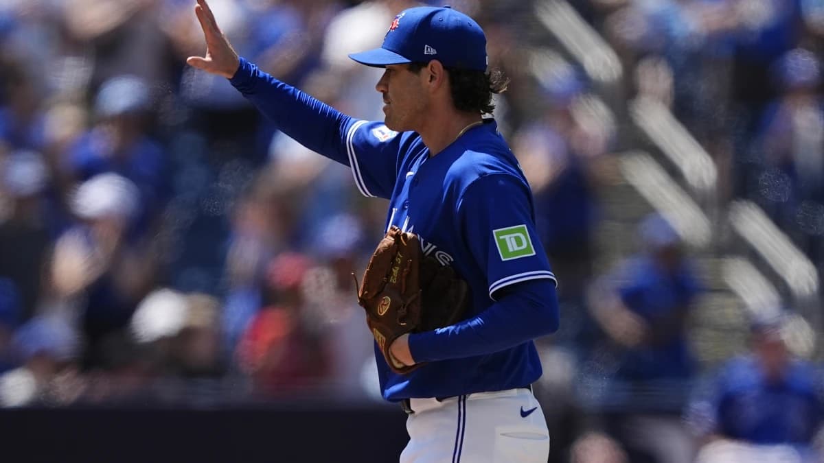 Toronto Blue Jays starting pitcher Shane Bieber (57) acknowledges the fans after getting his 1,000th career strike out during the fifth inning against the Texas Rangers at Rogers Centre.