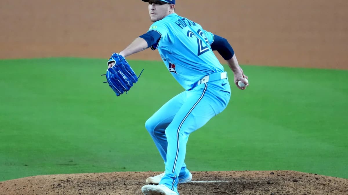 Toronto Blue Jays pitcher Jeff Hoffman (23) pitches against the Los Angeles Dodgers in the ninth inning during game five of the 2025 MLB World Series at Dodger Stadium.