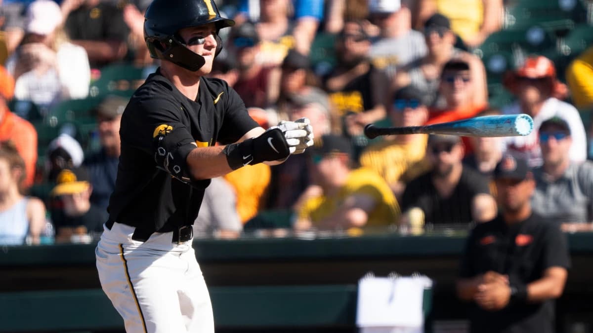 Iowa's Gable Mitchell tosses his bat after being walked during game 2 of Iowa vs. Oregon State baseball at Principal Park on May 10, 2025, in Des Moines.