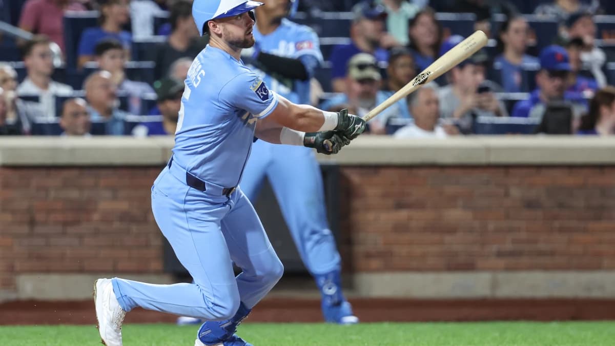 Kansas City Royals center fielder Lane Thomas (15) hits a double in the eighth inning against the New York Mets at Citi Field.