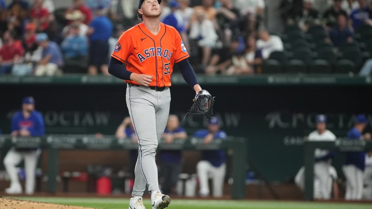 Houston Astros pitcher Nate Pearson (55) looks skyward as he comes out of the game against the Texas Rangers during the seventh inning at Globe Life Field.
