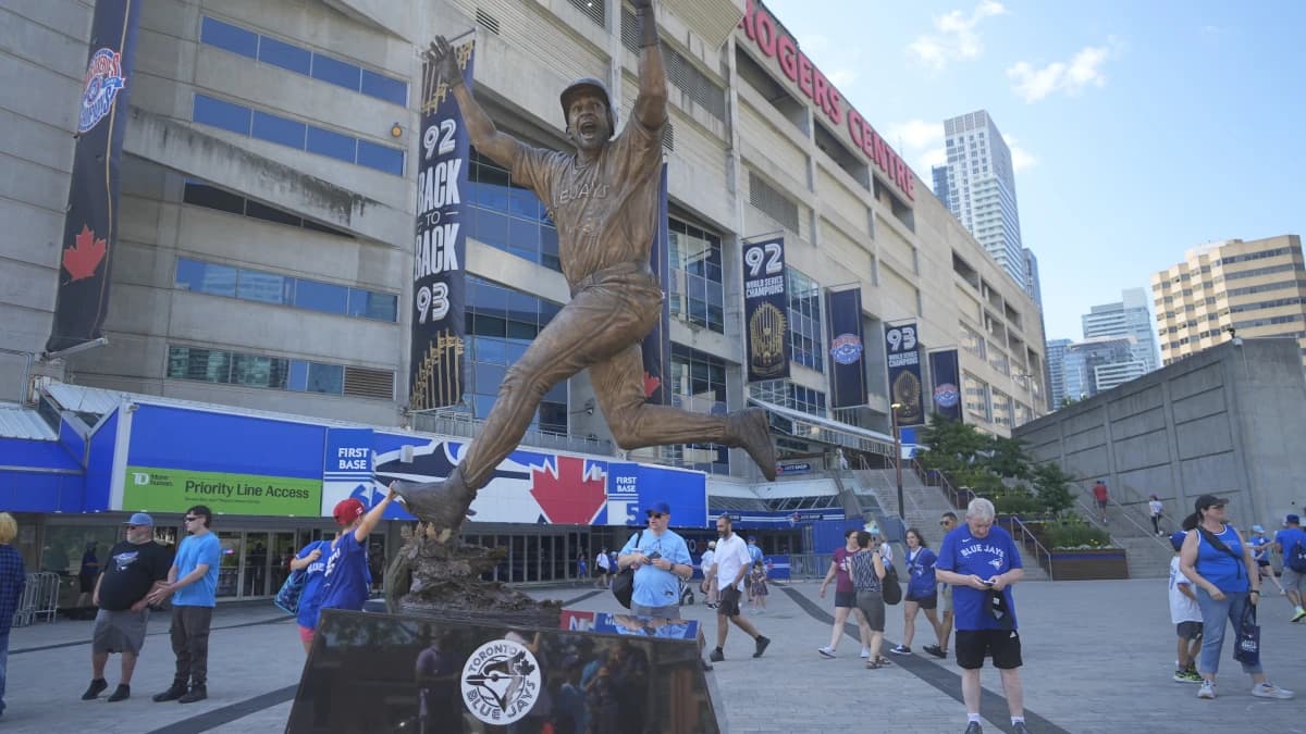 A statue of Joe Carter to commemorate the Toronto Blue Jays back to back World Series wins out side of Rogers Centre was unveiled before the start of the game against the Chicago White Sox yesterday.