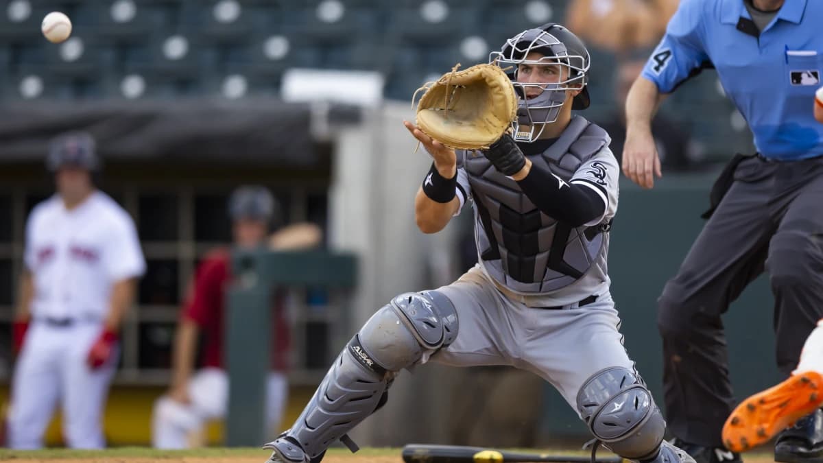 Chicago White Sox catcher Adam Hackenberg plays for the Glendale Desert Dogs during an Arizona Fall League baseball game at Phoenix Municipal Stadium.