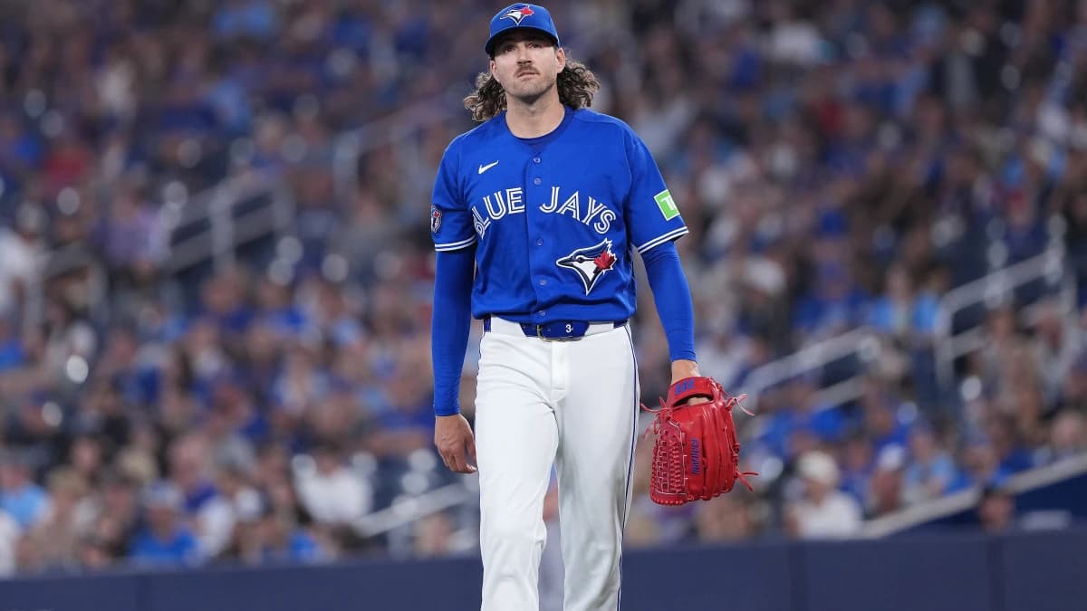 Toronto Blue Jays pitcher Kevin Gausman (34) walks toward the dugout against the Tampa Bay Rays during the first inning at Rogers Centre.