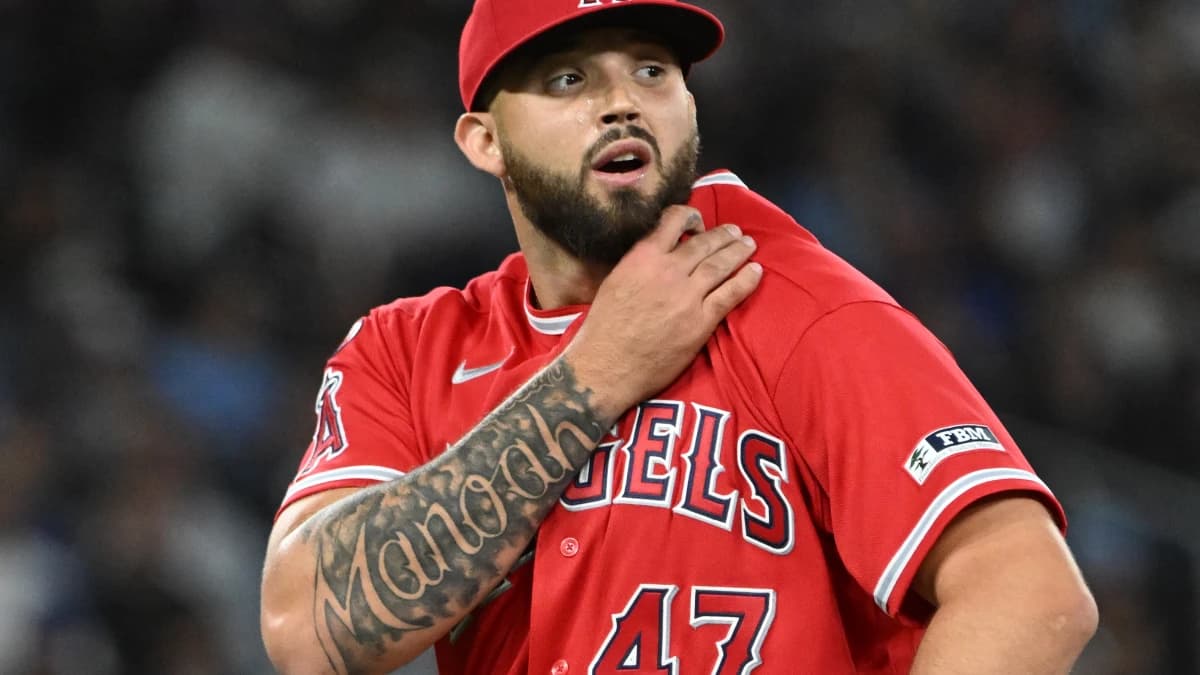 Los Angeles Angels relief pitcher Alek Manoah (47) returns to the dugout after pitching against the Toronto Blue Jays in the eighth inning at Rogers Centre.
