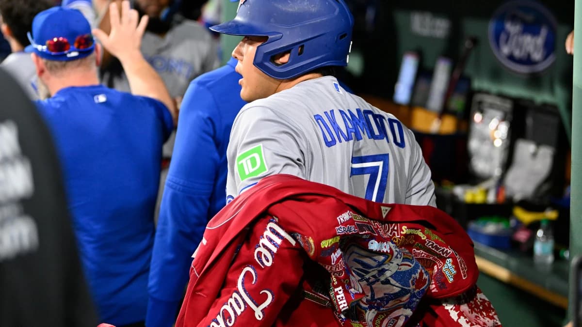 Toronto Blue Jays third baseman Kazuma Okamoto (7) celebrates a two run home against the Boston Red Sox during the seventh inning at Fenway Park.