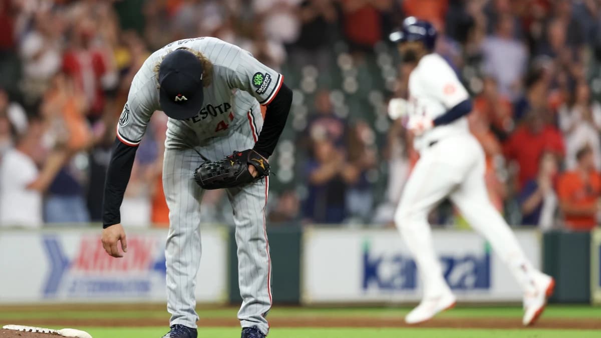 Minnesota Twins starting pitcher Joe Ryan (41) reacts to Houston Astros left fielder Yordan Alvarez (44) grand slam home run in the fourth inning at Daikin Park