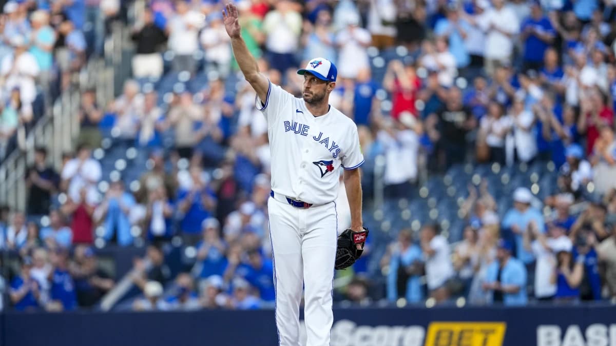 Toronto Blue Jays pitcher Max Scherzer (31) celebrates his career 3500th strike out against the Philadelphia Phillies during the first inning at Rogers Centre.