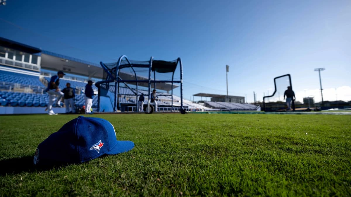 General view of a Toronto Blue Jays hat on the field during spring training at Spectrum Field