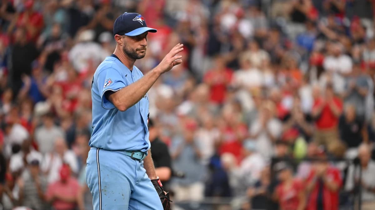 Toronto Blue Jays pitcher Max Scherzer (31) acknowledges the crowd after getting pulled against the Washington Nationals during the third inning at Nationals Park.