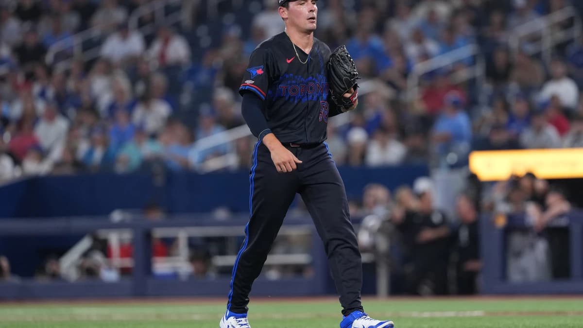 Toronto Blue Jays relief pitcher CJ Van Eyk (58) walks to the dugout against the Chicago White Sox in his MLB debut during the ninth inning at Rogers Centre.