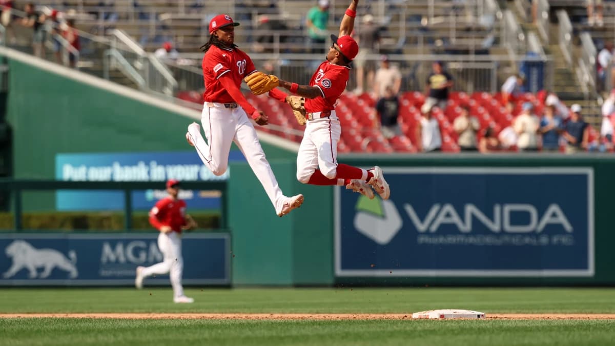 Washington Nationals shortstop CJ Abrams (5) and Nationals second baseman Nasim Nuñez (26) celebrate after the final out against the Arizona Diamondbacks at Nationals Park.
