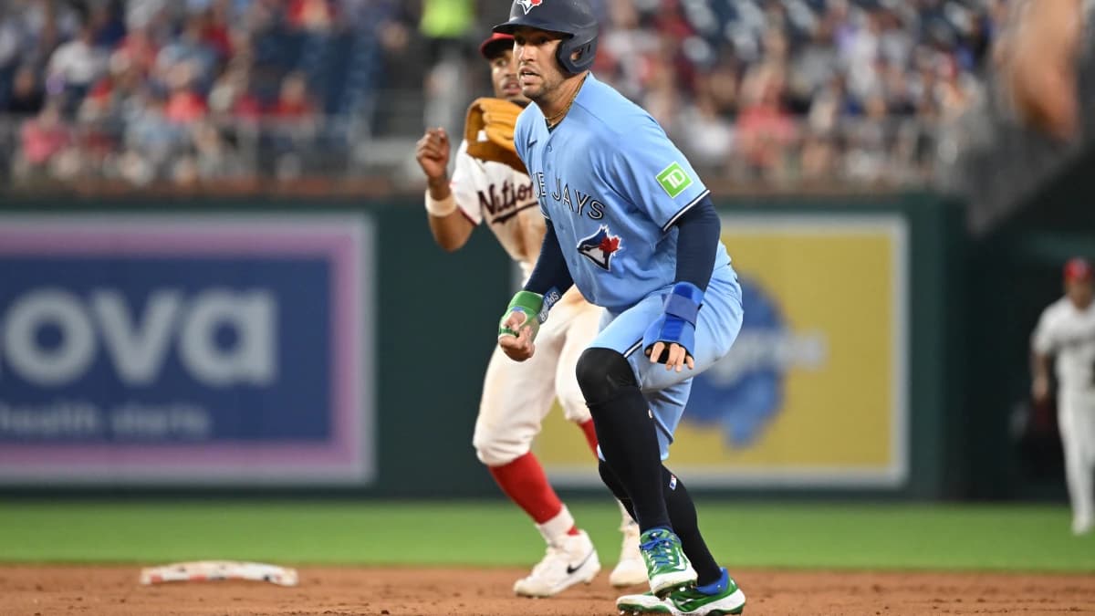 Toronto Blue Jays designated hitter George Springer (4) is caught in a rundown between first and second base against the Washington Nationals during the fifth inning at Nationals Park